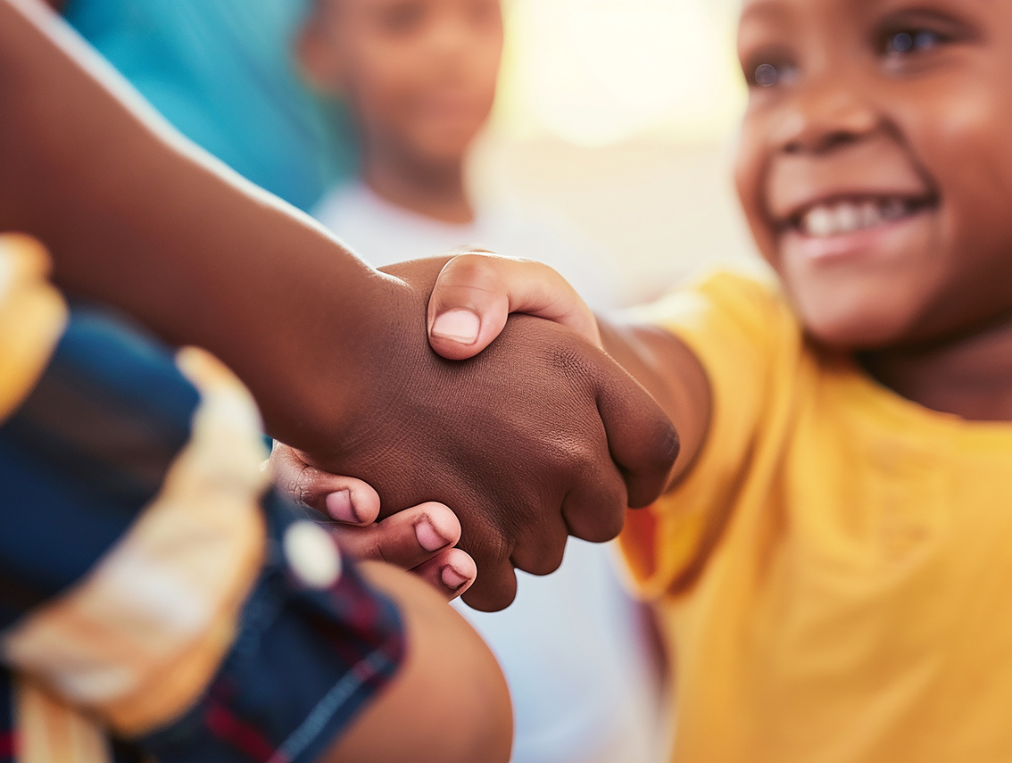 Hands joined in a gesture of care and support